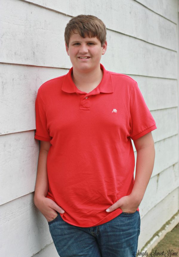 Boy by Wall